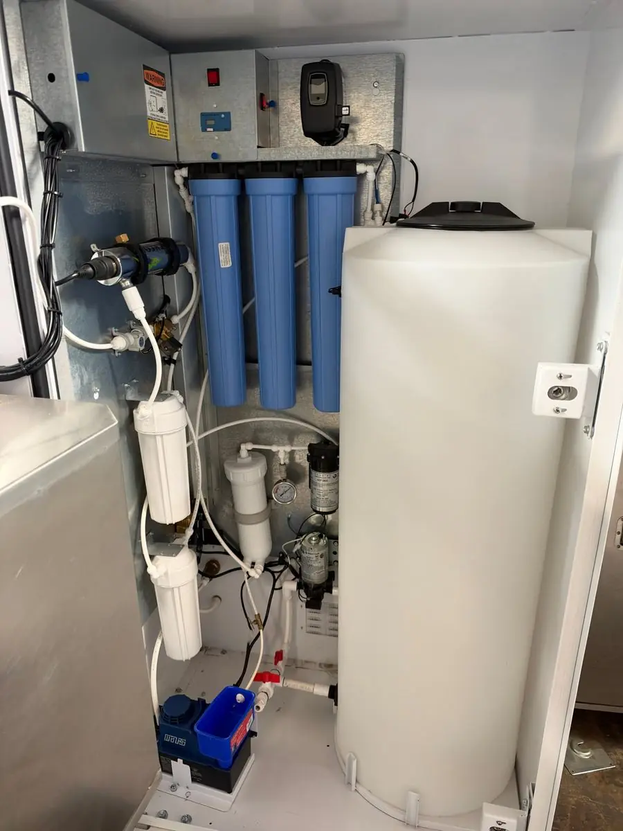 Inside an AquaBox water machine with each purification stage labeled